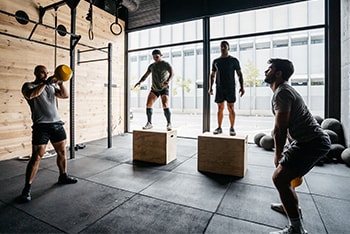 People exercising in a crossfit gym